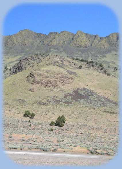 
lake abert on the oregon outback scenic byway, an ancient alkaline lake on what maybe the largest geologic fault in north america, ancient petroglyphs from native people, birding site, oregon's high desert.