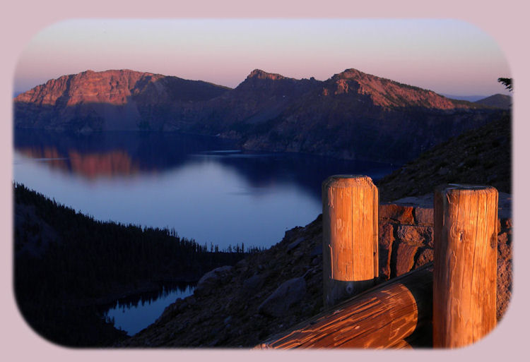 sunset at Crater Lake National Park in the cascade mountains of oregon.
