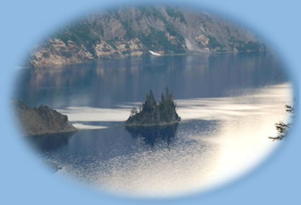 
phantom ship at crater lake national park in oregon, not far from gathering light ... a retreat in southern oregon: cabins, tree houses on the river in the forest.