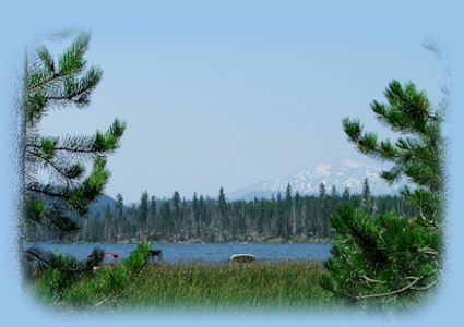 
lava lake and bachelor butte in the cascade mountains, on the cascade lakes scenic byway in central oregon offering more than a hundred alpine lakes, hiking trails and mountains, not far from bend, oregon.