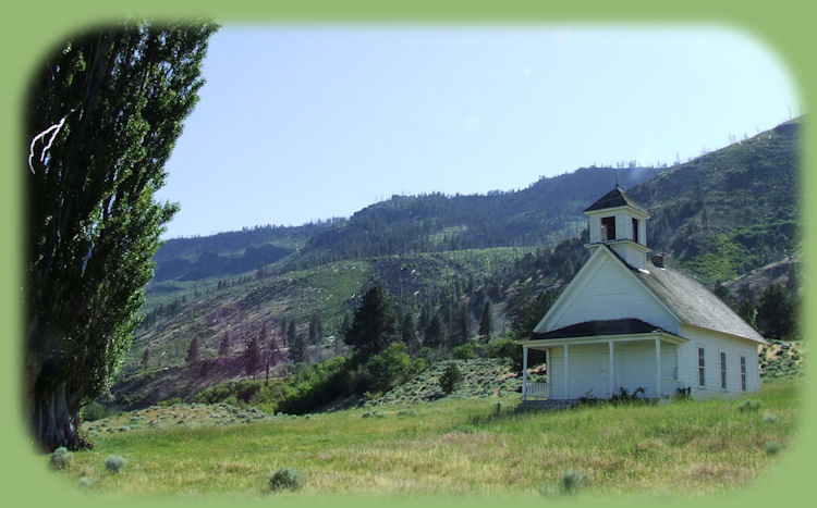 winter ridge in the background with old settler's school in the foreground, photograph taken at summer lake on the oregon outback scenic byway.